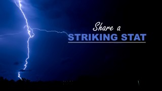 Lightning strike against a black night sky
